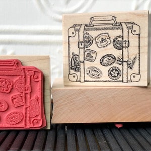 World Traveller vintage suitcase rubber stamp from oldislandstamps