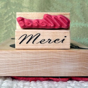 Merci rubber stamp from oldislandstamps