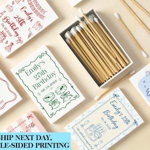 May include: A collection of rectangular matchboxes featuring custom birthday designs for Emily's 25th Birthday on 06.18.2028, with various illustrations including cakes, martini glasses, and bows, alongside an open box filled with wooden matches.