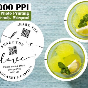 May include: White round stickers with the text "SHARE THE love" and a QR code. The stickers also include the names "MARGARET & CASPIAN" and the text "Please scan & share your photos with us!" The image also shows two glasses with yellow sorbet, lemon slices, and mint.