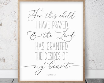 May include: A framed print with a white background and black text. The text reads "For this child I have prayed & the Lord has granted the desires of my heart." The bottom of the print includes the scripture reference "I Samuel 1:27".