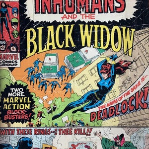 May include: Vintage comic book cover featuring "The Inhumans and The Black Widow." The cover art showcases action scenes with characters in vibrant colors, including Black Widow in a dynamic pose, police cars, and other heroes.