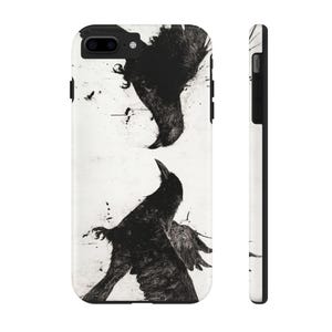May include: Black and white phone case with a graphic of two crows in flight. The crows are facing each other and appear to be in mid-air.
