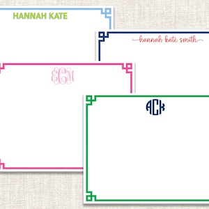 May include: Four rectangular white note cards featuring colored Greek key borders. The cards display personalized text including the names HANNAH KATE and hannah kate smith, and two circular monograms with the letters ECM and ACK in pink and navy blue.