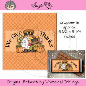 May include: Thanksgiving-themed candy bar wrapper with a gnome and turkey design. The wrapper is approximately 5 1/2 x 5 1/4 inches. The design includes pumpkins, sunflowers, and the text "We Give Thanks". Original artwork by Whimsical Inklings.