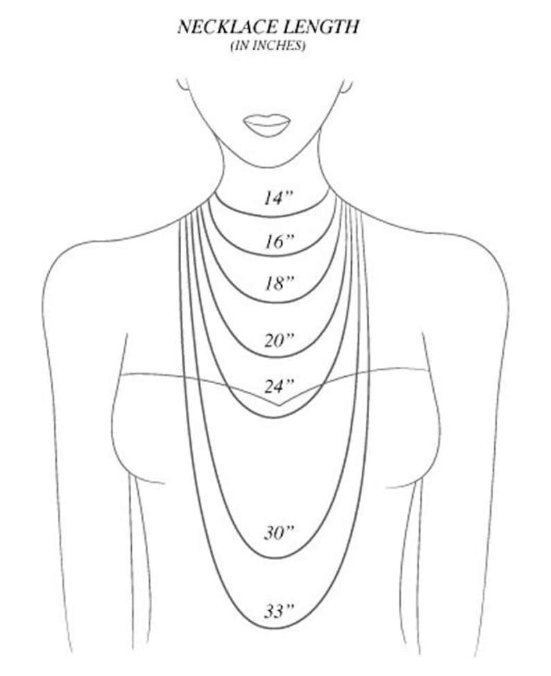 May include: Illustration showing necklace lengths on a person. The image displays necklaces of varying lengths: 14", 16", 18", 20", 24", 30", and 33" to demonstrate how they would appear when worn. The text at the top reads "NECKLACE LENGTH (IN INCHES)".
