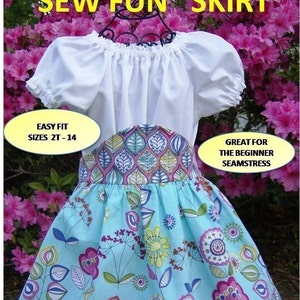 May include: A turquoise skirt with a floral print and a colorful patterned waistband. The skirt is on a hanger and has the text "SEW FUN" SKIRT, EASY FIT SIZES 2T-14, GREAT FOR THE BEGINNER SEAMSTRESS.