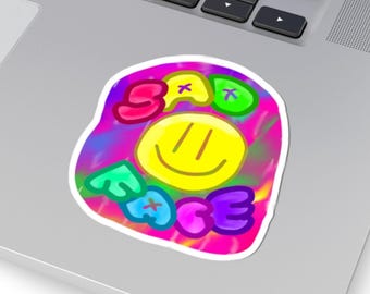 Pegatina de cara sonriente triste