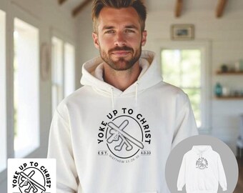 May include: White hoodie with a black circle graphic that says "Yoke Up To Christ" with a cross and the text "EST. Matthew 11:28-30 A.D.33".