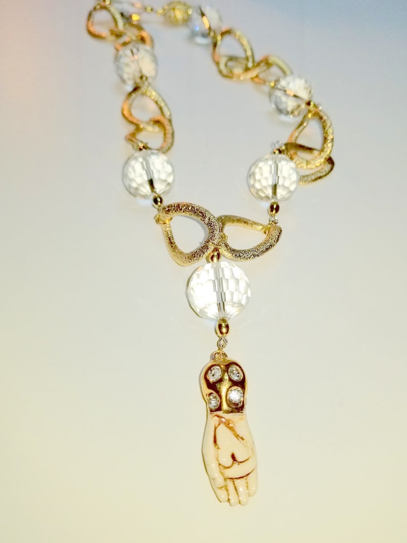 Faceted Rock Crystal Quartz on a Gold Tone Necklace