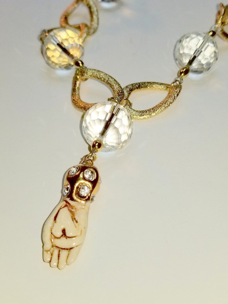 Faceted Rock Crystal Quartz on a Gold Tone Necklace
