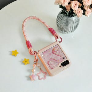 Leuke leren draagriem met sterhanger voor Samsung Galaxy Z Flip 6 5 4 3 – roze scharnier Schokbestendige beschermhoes met riem