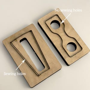 a couple of wooden pieces with holes in them