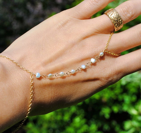 Items similar to gold filled pearl ring bracelet on Etsy