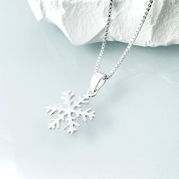 Snowflake Pendant 8-point with 9 Cubic Zirconia Sterling Silver - Includes Chain Snowflake Pendant 8-point with 9 Cubic Zirconia Sterling Silver - Includes Chain