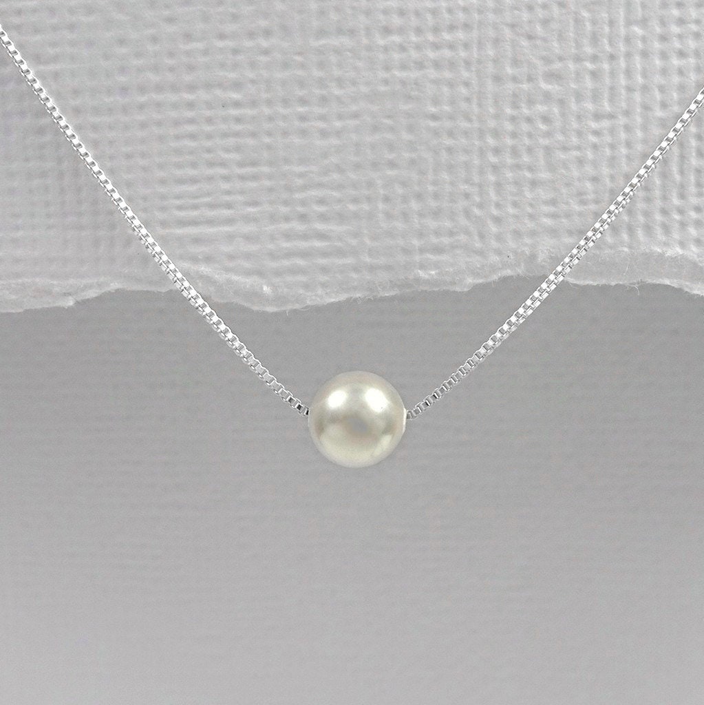 Pearl necklace hanging