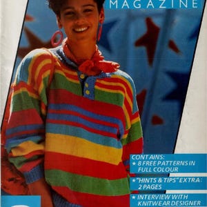 May include: A magazine cover featuring a woman wearing a colorful, striped sweater. The sweater has horizontal stripes in red, yellow, green, and blue. The magazine title is "BOND MAGAZINE". The cover also includes text about free patterns and a knitwear designer interview.