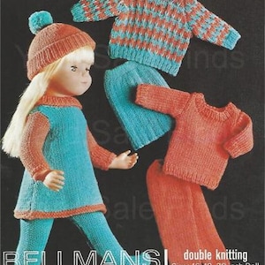 May include: A doll wearing a knitted outfit, including a dress, leggings, and a hat. The outfit is primarily turquoise with orange accents. Additional knitted sets in orange and turquoise are also displayed. The text "BELLMANS" is visible.