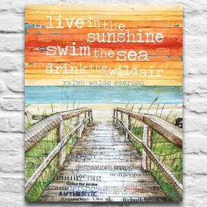 May include: A watercolour painting of a wooden walkway leading to a beach with a quote by Ralph Waldo Emerson: "Live in the sunshine, swim the sea, drink the wild air."