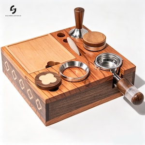 May include: A wooden espresso coffee station organizer featuring a square base with inlaid clover patterns, a portafilter holder, a metal tamper, a circular wooden lid, a dosing ring, and a square recessed tray for coffee accessories.