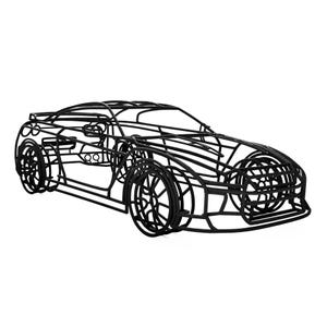 May include: Black metal sculpture of a sports car. The car is depicted in a wireframe style, showcasing the vehicle's shape and design. The wheels, body, and windows are all outlined in black metal.