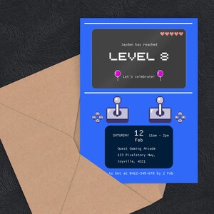 Printed arcade game birthday invitation with blue arcade machine design and retro game elements, perfect for kids' parties