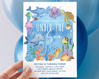 May include: Under the Sea themed birthday party invitation with watercolor illustrations of sea creatures, coral, and a seashell. The invitation includes the text "Please join us Under the Sea" and details for the party, including the date, time, location, and RSVP information.