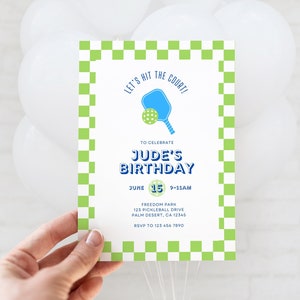 May include: A green and white checkered invitation for a birthday party. The invitation says "Let's hit the court!" and features a blue and green paddleball. The text says "To celebrate Jude's Birthday June 15 9-11am Freedom Park 123 Pickleball Drive Palm Desert, CA 12345 RSVP to 123 456 7890"