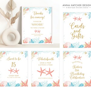 May include: A collection of beach-themed party signs with gold lettering and watercolor illustrations of seashells, starfish, and coral. The signs include phrases like "Cards and Gifts," "Photobooth," and "Welcome to Katie's 15th Birthday Celebration."