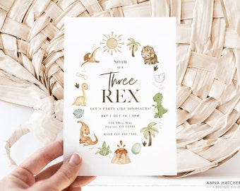 May include: A white invitation card with a brown and green dinosaur theme. The text reads "Noah is a Three Rex. Let's party like dinosaurs! Sat | Oct 14 | 3PM. 123 T-Rex Way, Denver, CO 12345. RSVP 123.456.7890."