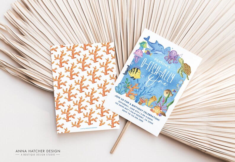 May include: A blue and white birthday invitation with a watercolor illustration of a dolphin, octopus, turtle, and other sea creatures. The text reads "Peyton's O-Fish-Ally One".