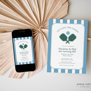 May include: A blue and white striped invitation with the text "Let's Hit the Court!" and a graphic of two green pickleball paddles and a ball. The invitation is for Suzanne and Phil's 60th birthday party. The text also includes the date, time, and location of the party.