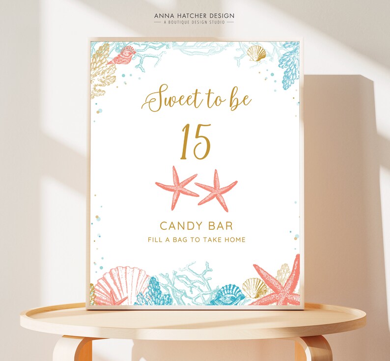 May include: A framed sign with a white background features the text "Sweet to be 15" in gold script, with coral starfish and sea life illustrations. The words "CANDY BAR" and "FILL A BAG TO TAKE HOME" are also included.