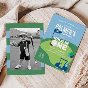 May include: A green and blue golf-themed birthday invitation with a photo of a young boy holding a golf club. The invitation says "Palmer's 1st Birthday" and "Hole-in-One".