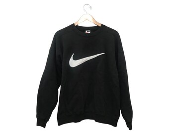 big swoosh nike sweatshirt