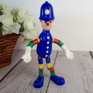 Vintage plastic toy, police officer figurine, MERIT Safe-Play Nursery Toy brand, toy with bendable arms and legs, made in England, 1960s image 8