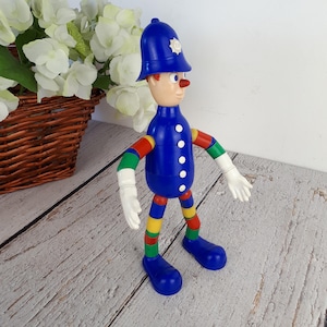 Vintage plastic toy, police officer figurine, MERIT Safe-Play Nursery Toy brand, toy with bendable arms and legs, made in England, 1960s image 2