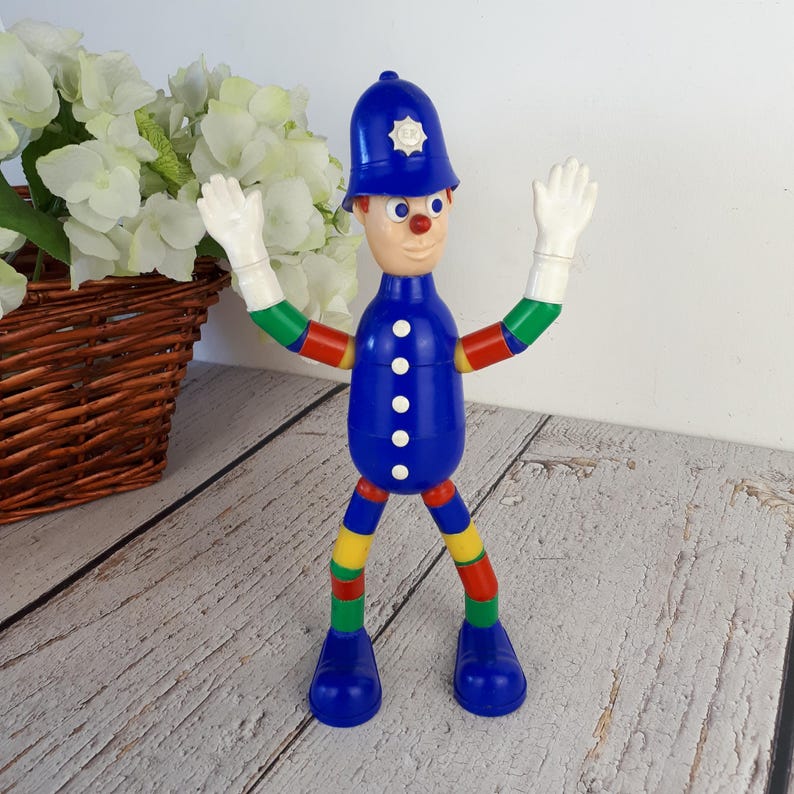 Vintage plastic toy, police officer figurine, MERIT Safe-Play Nursery Toy brand, toy with bendable arms and legs, made in England, 1960s image 3