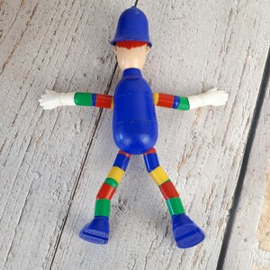 Vintage plastic toy, police officer figurine, MERIT Safe-Play Nursery Toy brand, toy with bendable arms and legs, made in England, 1960s image 5