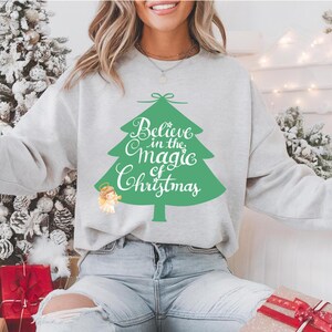 Believe In The Magic Of Christmas Sweatshirt: Holiday Party Shirt