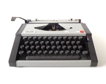 Olivetti Rtopical typewriter, portable typewriter ,