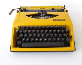 Triumph Tippa Typewriter, Yellow typewriter, portable typewriter