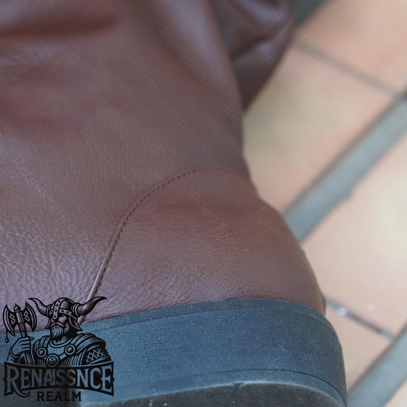 May include: Close-up of the bottom of a brown leather boot with a black rubber sole. The boot has a seam running along the back of the heel.