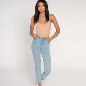 90s Calvin Klein Jeans 25 Skinny Mom Jeans Blue High Waisted Jeans CK Slim Denim Pants Tapered Blue 1990s Vintage Extra Small xs 2