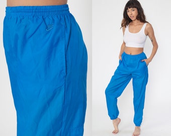 blue nike jogging suit
