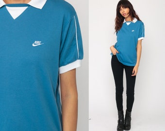Items similar to Reebok T Shirt 80s Athletic TShirt Sports Reebok Tops | Athletic Tshirt | Poshmark
