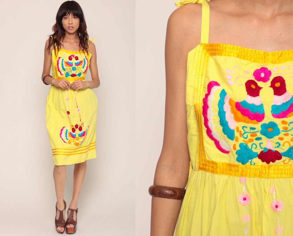 peacocks yellow dress