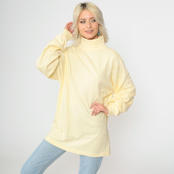 pale yellow long sleeve shirt