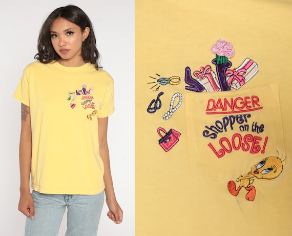 Shopper on The Loose Shirt 90s Tweety Bird T Shirt Yellow Embroidered Cartoon Shopaholic T-Shirt Shoe Shopping Cartoon Vintage 1990s Small S