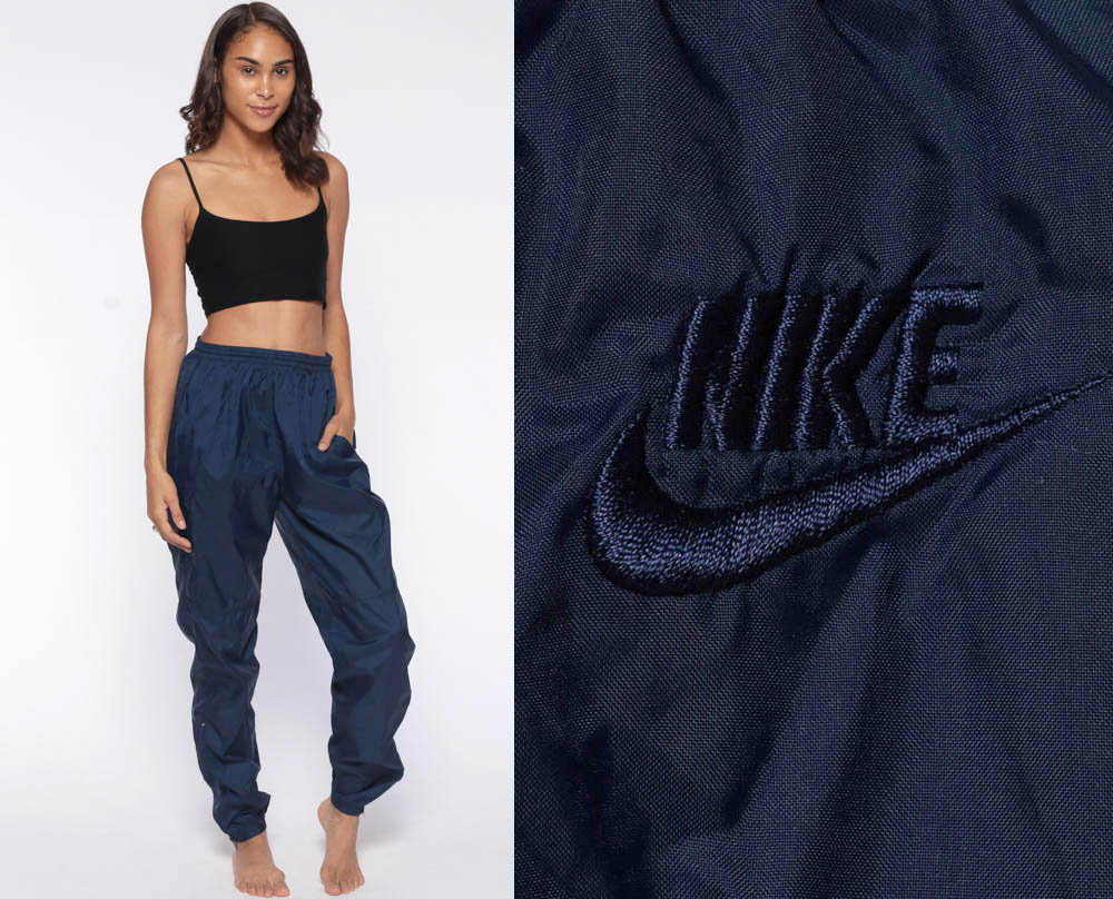 navy blue nike track pants